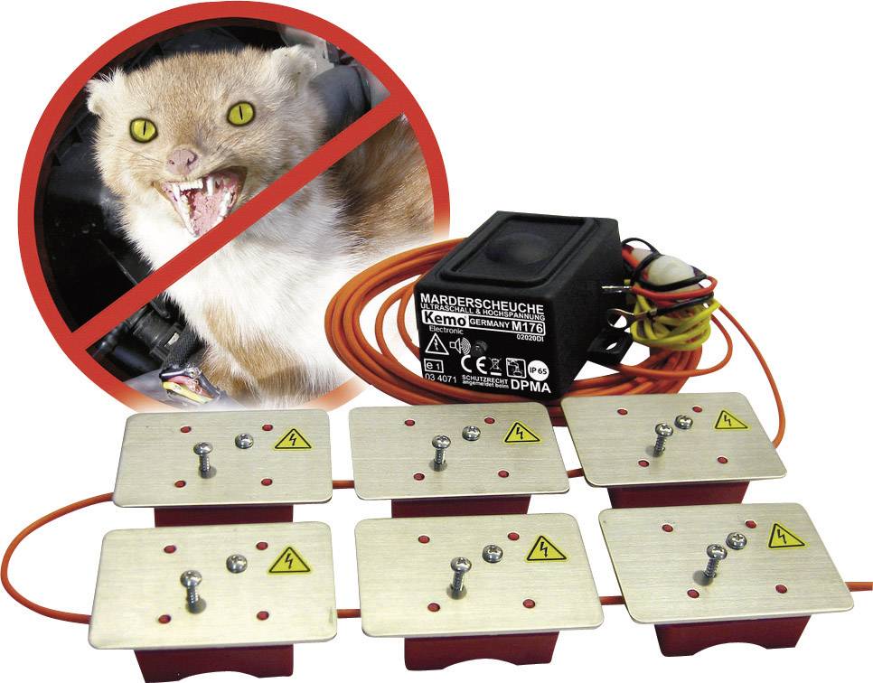 Electronic Marten Deterrent System: Six metal plates with cables, bearing warnings and symbols, prevent animal bites in vehicles.