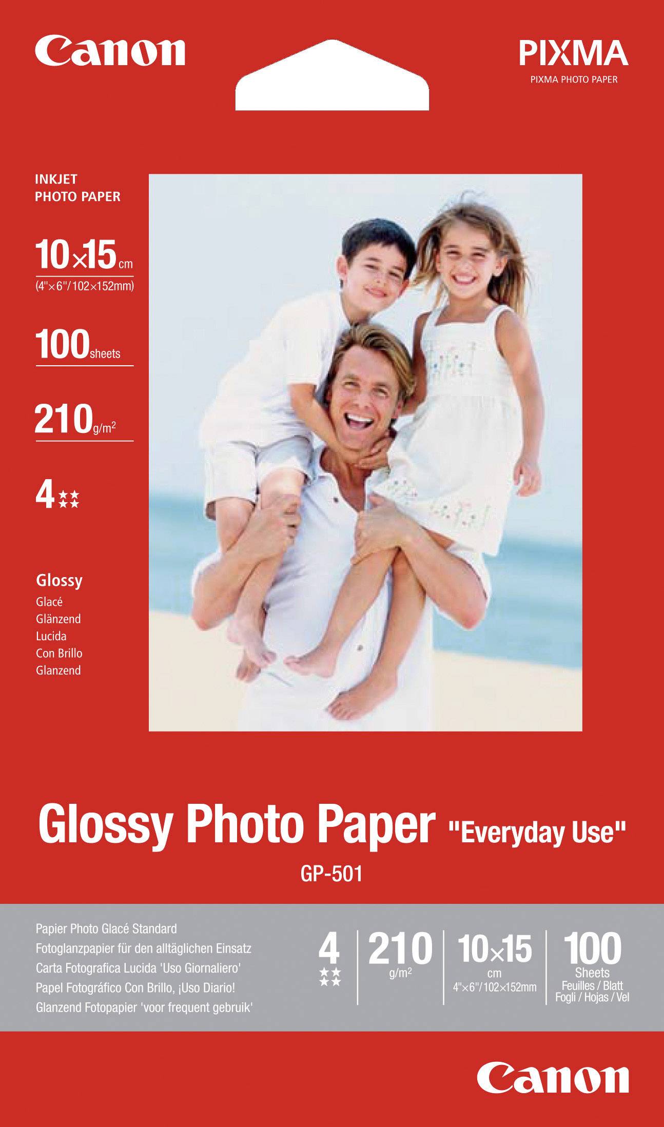 Packaging for 'Canon Glossy Photo Paper GP-501', featuring a father with two children on a beach. 10x15 cm, 100 sheets, for everyday use.