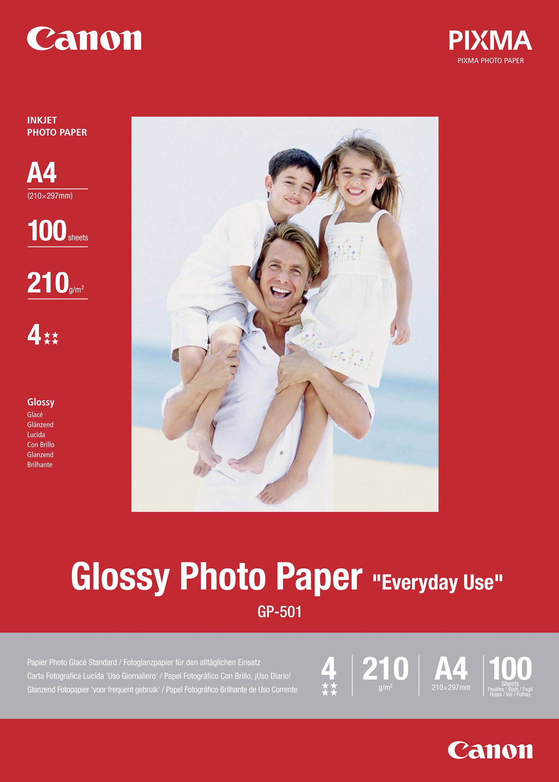 Canon PIXMA Inkjet Photo Paper, A4, 100 Sheets, Glossy Finish. Photo of a man with two children on the beach. Model: GP-501.