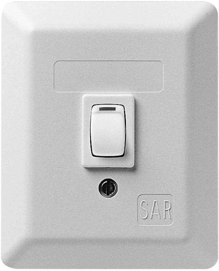 A simple light switch on a white plate, switched on in the upper position.