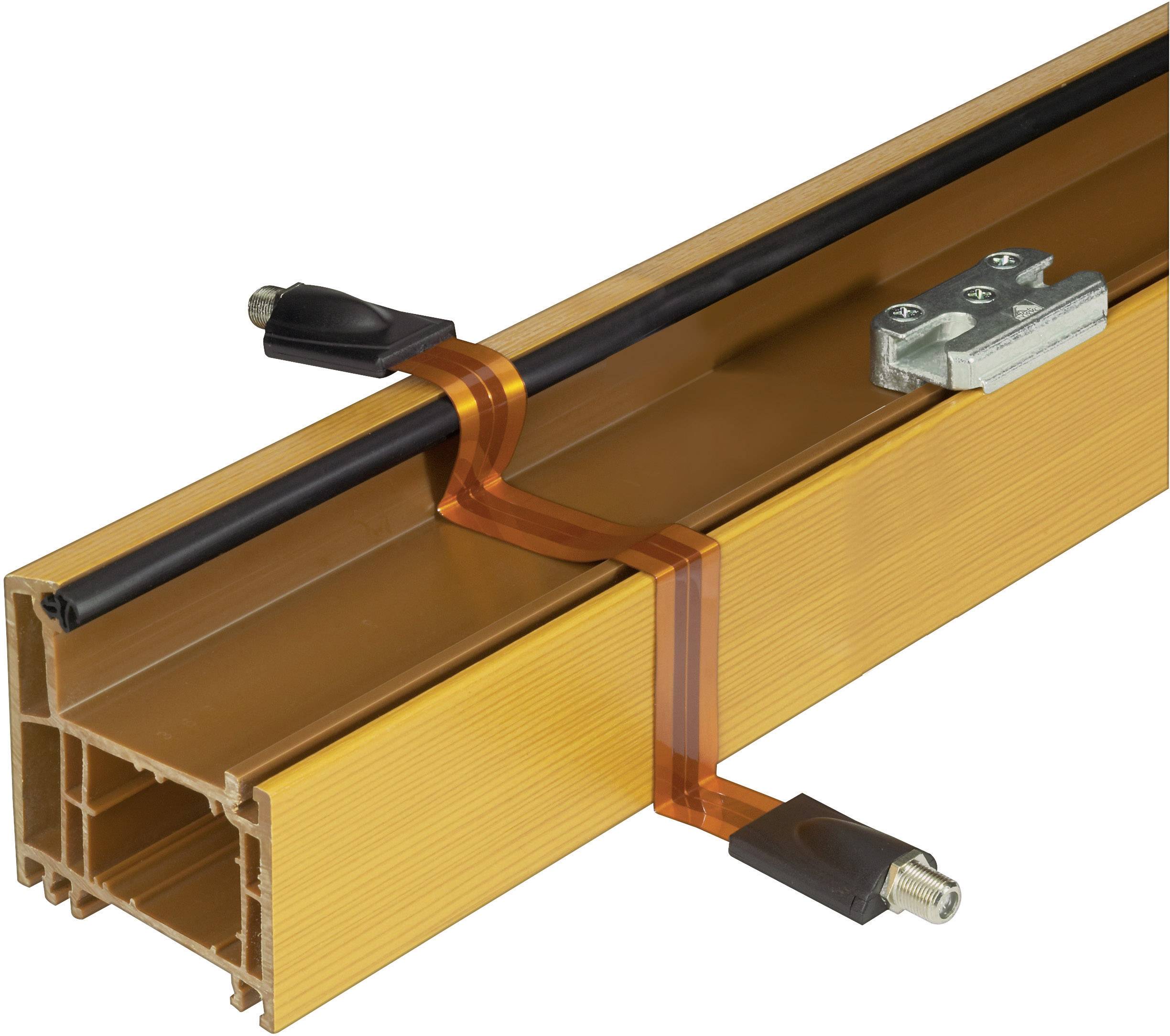 Plastic profile carrier with copper strips and mounting clips for electrical cables on the top surface.