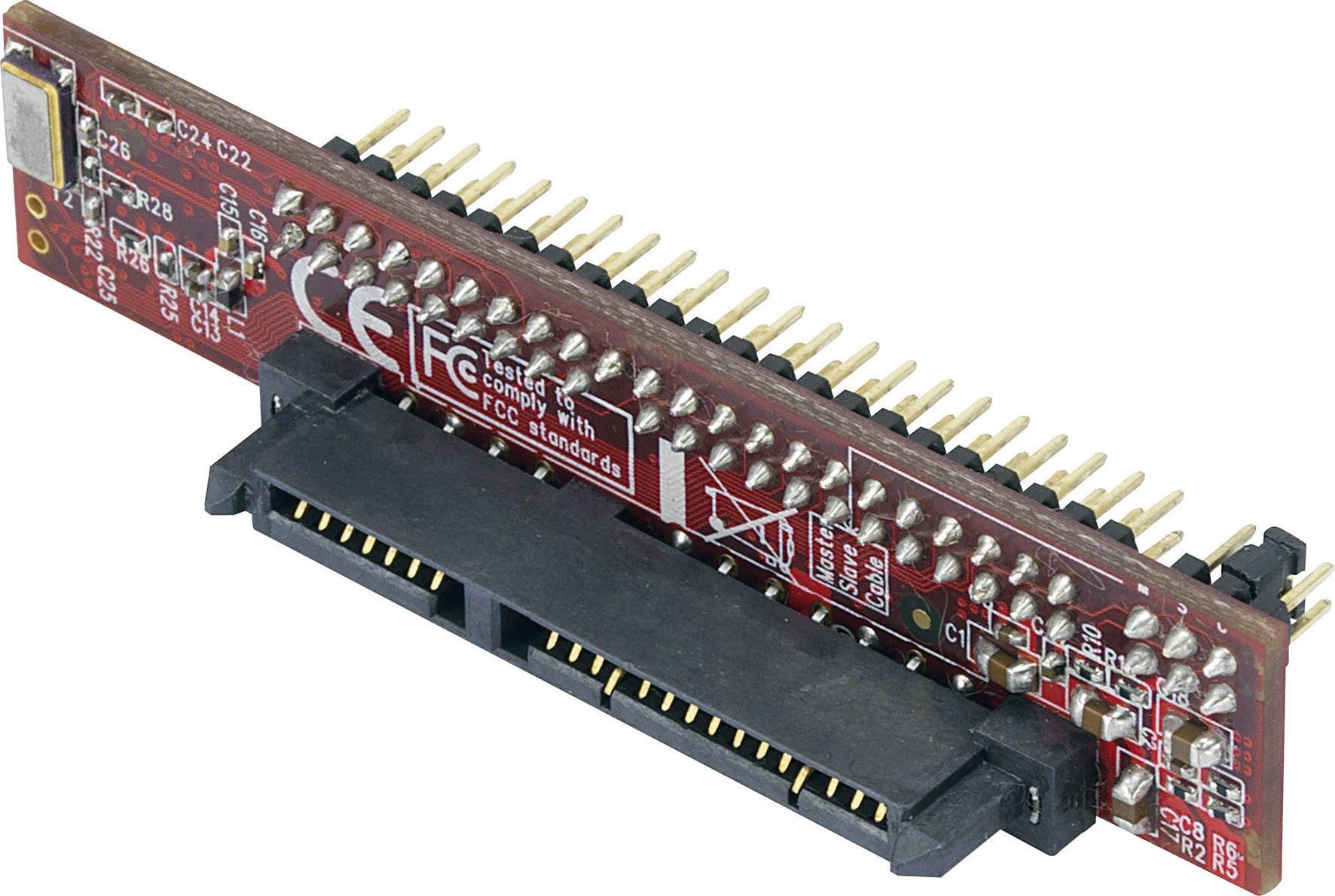 Close-up of a red PCB with golden connection pins, CE marking, and FCC compliance notice.