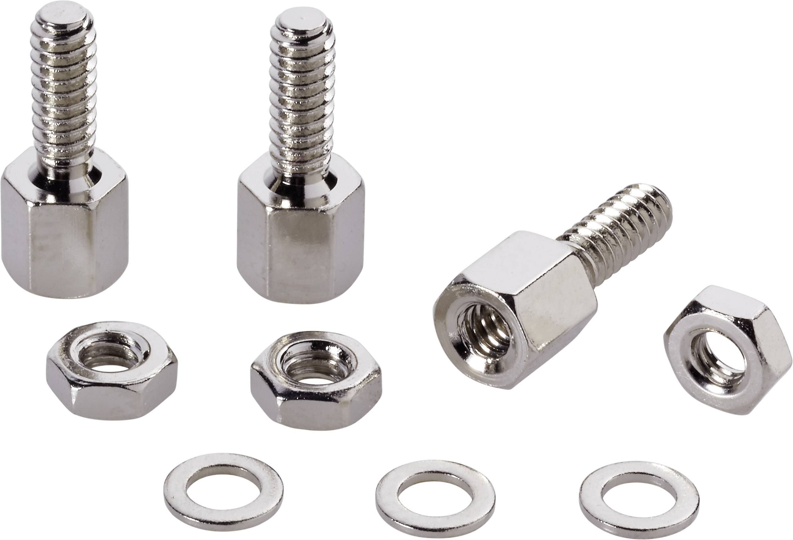 Several metal nuts, bolts, and washers are arranged on a white surface.