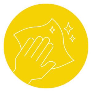 Eine Hand, die mit einem Tuch eine Oberfläche abwischt, symbolisiert Reinigung oder Sauberkeit auf einem runden gelben Hintergrund.