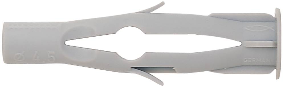 Gros plan d'une cheville murale en plastique gris ou d'une fiche pour plaque de plâtre avec une fente centrale et des ailettes à barbes pour fixer une vis dans un mur.