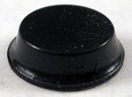 Socle magnétique noir, rond, sur une surface claire, légèrement surélevé, lisse et réfléchissant.
