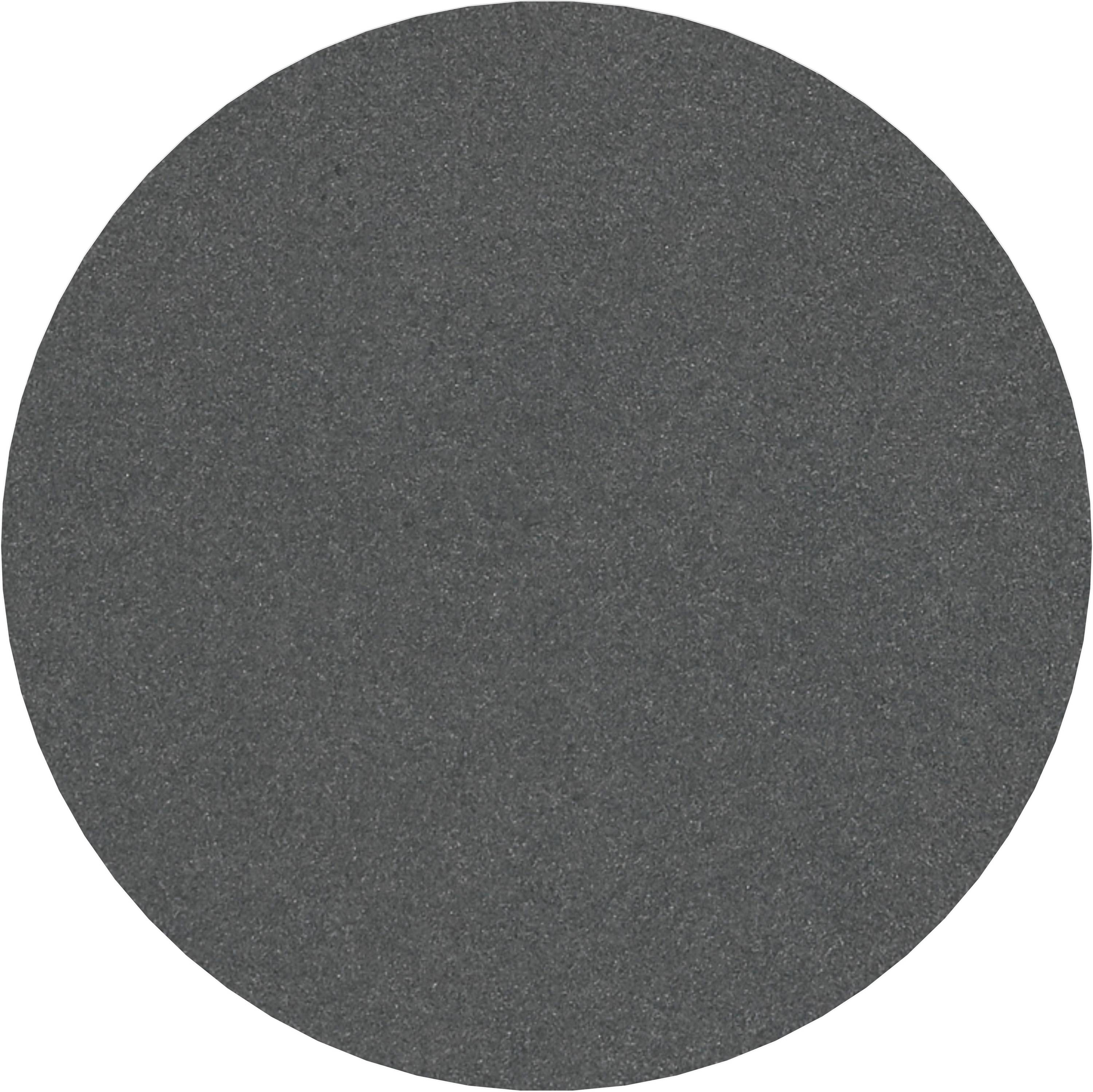 Une surface ronde, grise avec une apparence texturée, semblable à du papier de verre.