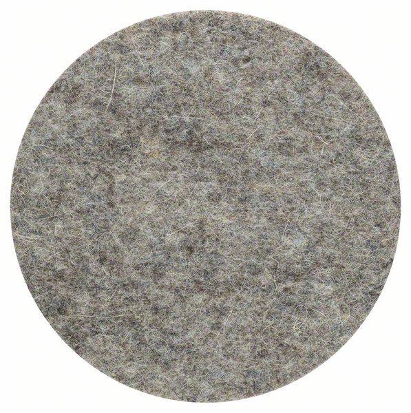 Surface grise en feutre ovale avec une texture fine et irrégulière.
