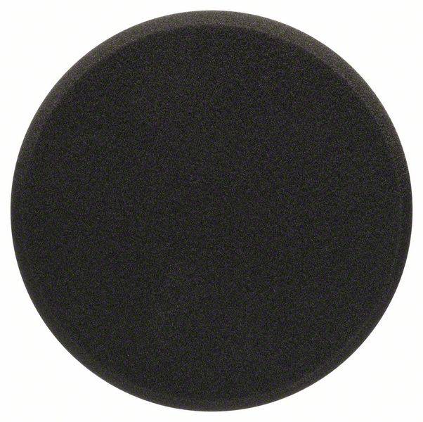Un objet rond noir qui ressemble à une surface plate à la structure uniforme.