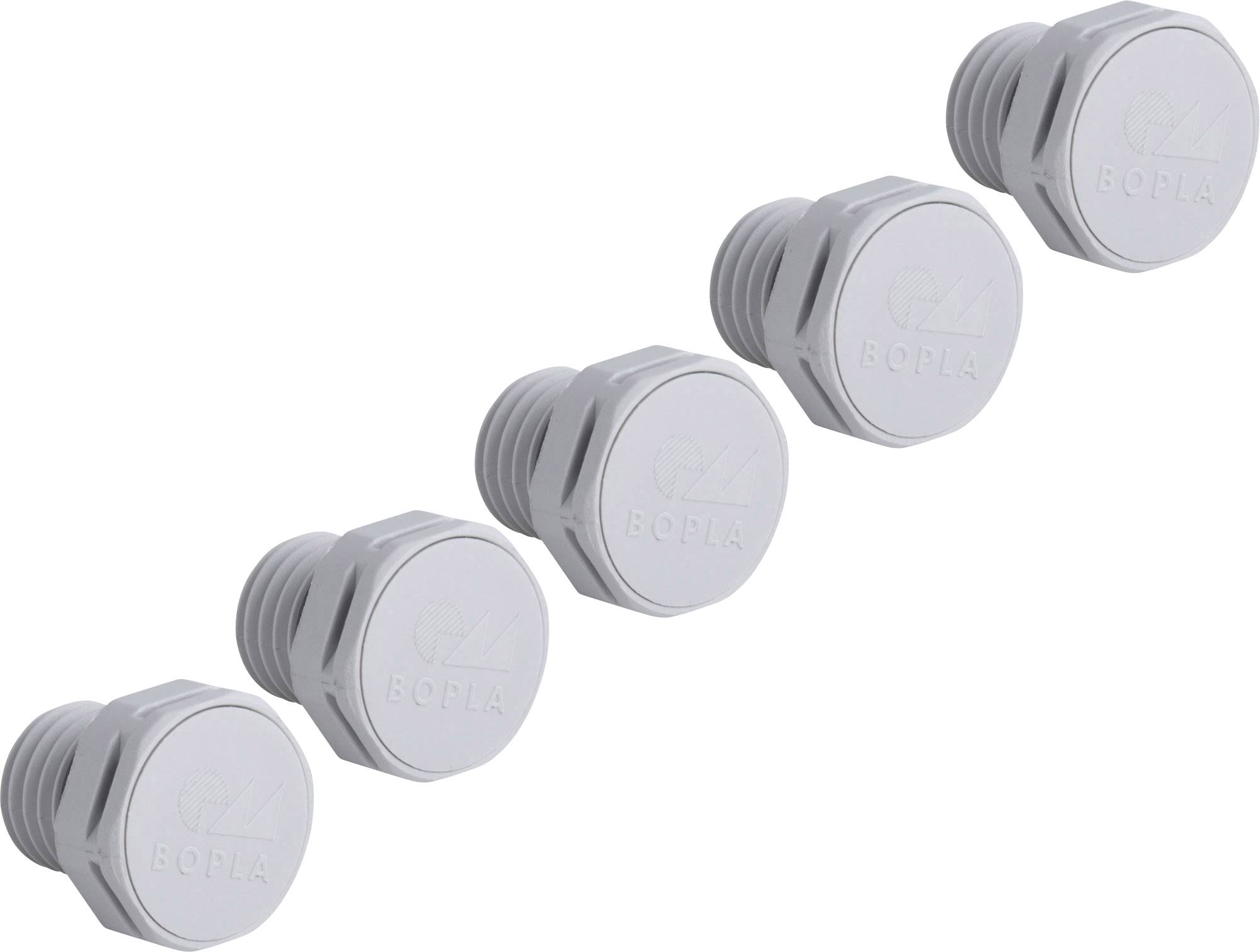 Cinq bouchons en plastique blanc de forme hexagonale, posés côte à côte.