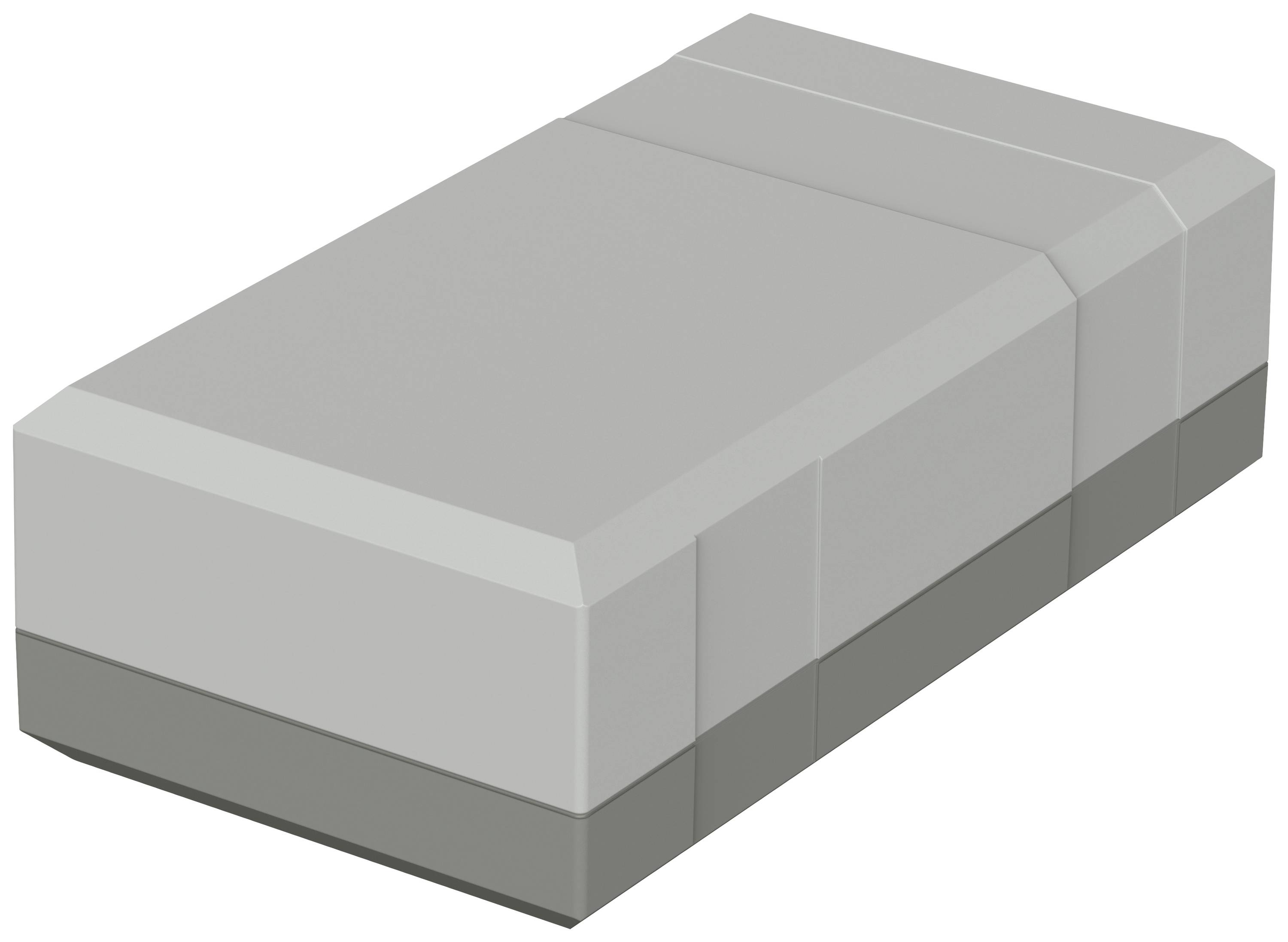 Un gomme à effacer rectangulaire grise aux bords biseautés est posée sur une surface plane.