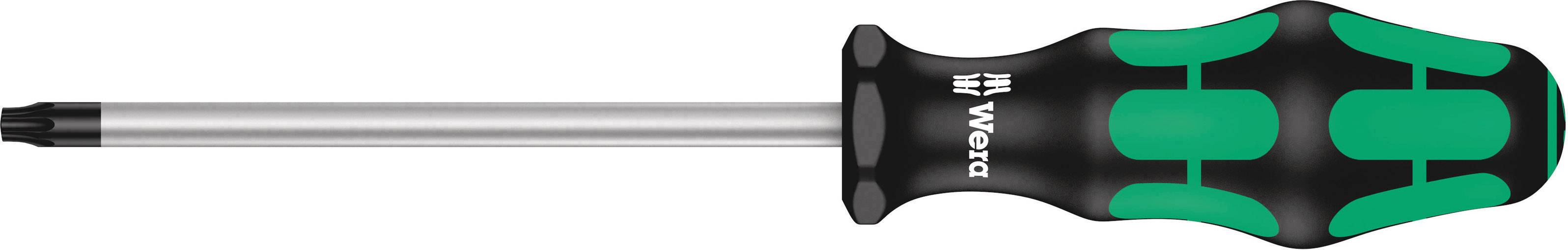 Un tournevis à manche vert et noir avec une lame Torx argentée.