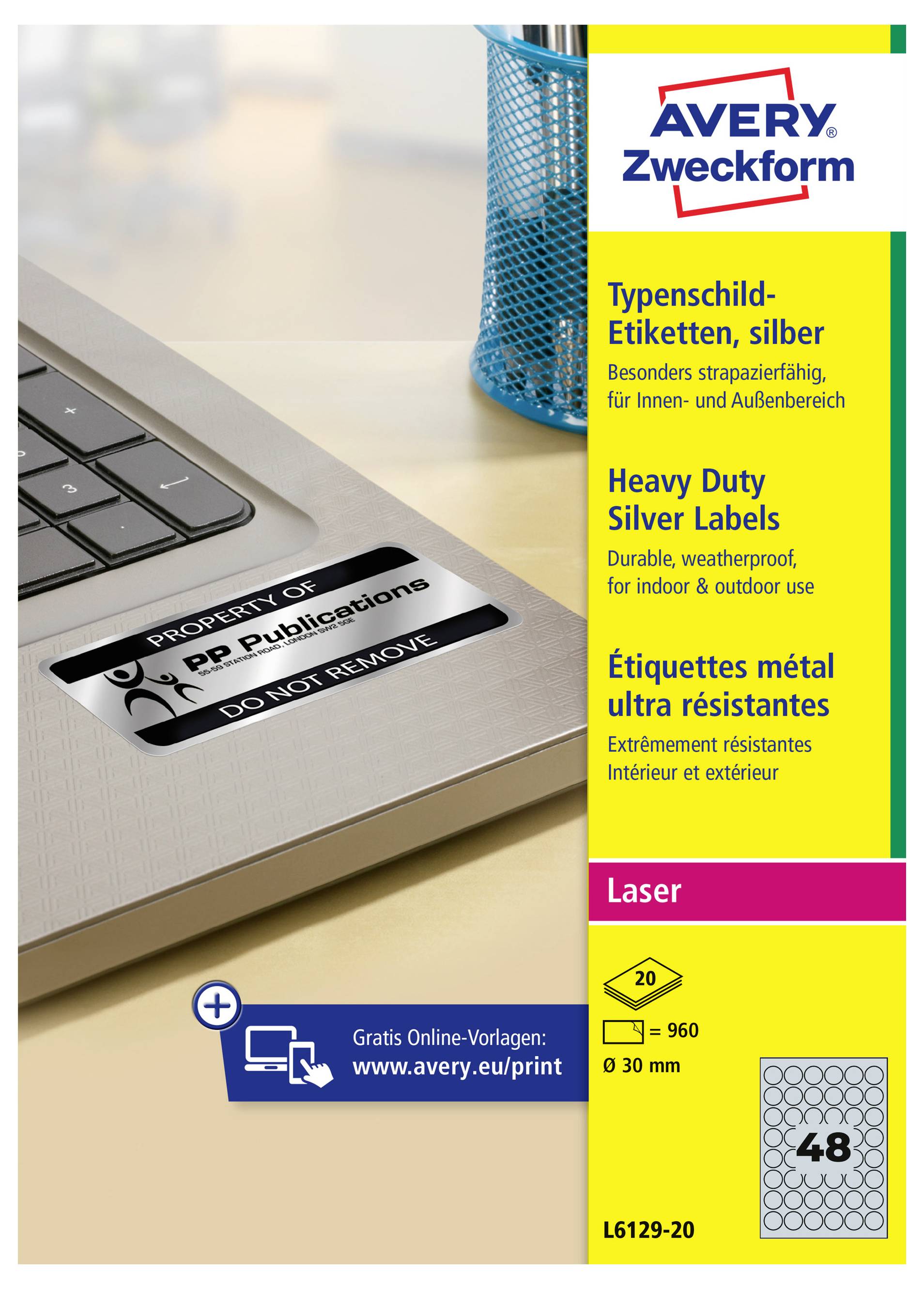 Paquet d'étiquettes argentées « Heavy Duty » d'Avery Zweckform contenant 48 étiquettes rondes de 30 mm pour imprimantes laser, présenté à côté d'un exemple d'étiquette d'ordinateur portable.