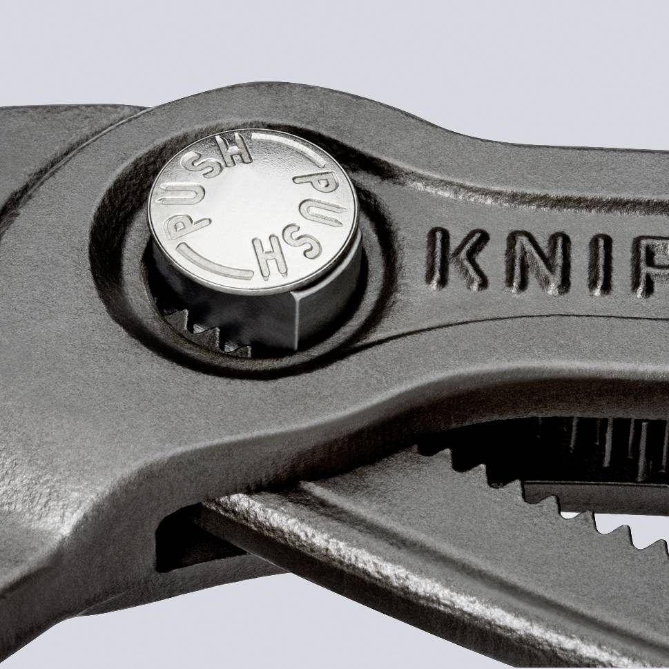 Une pince métallique portant l'inscription 'KNIPEX' et munie d'un bouton-poussoir permettant d'ajuster facilement l'écartement des mâchoires.