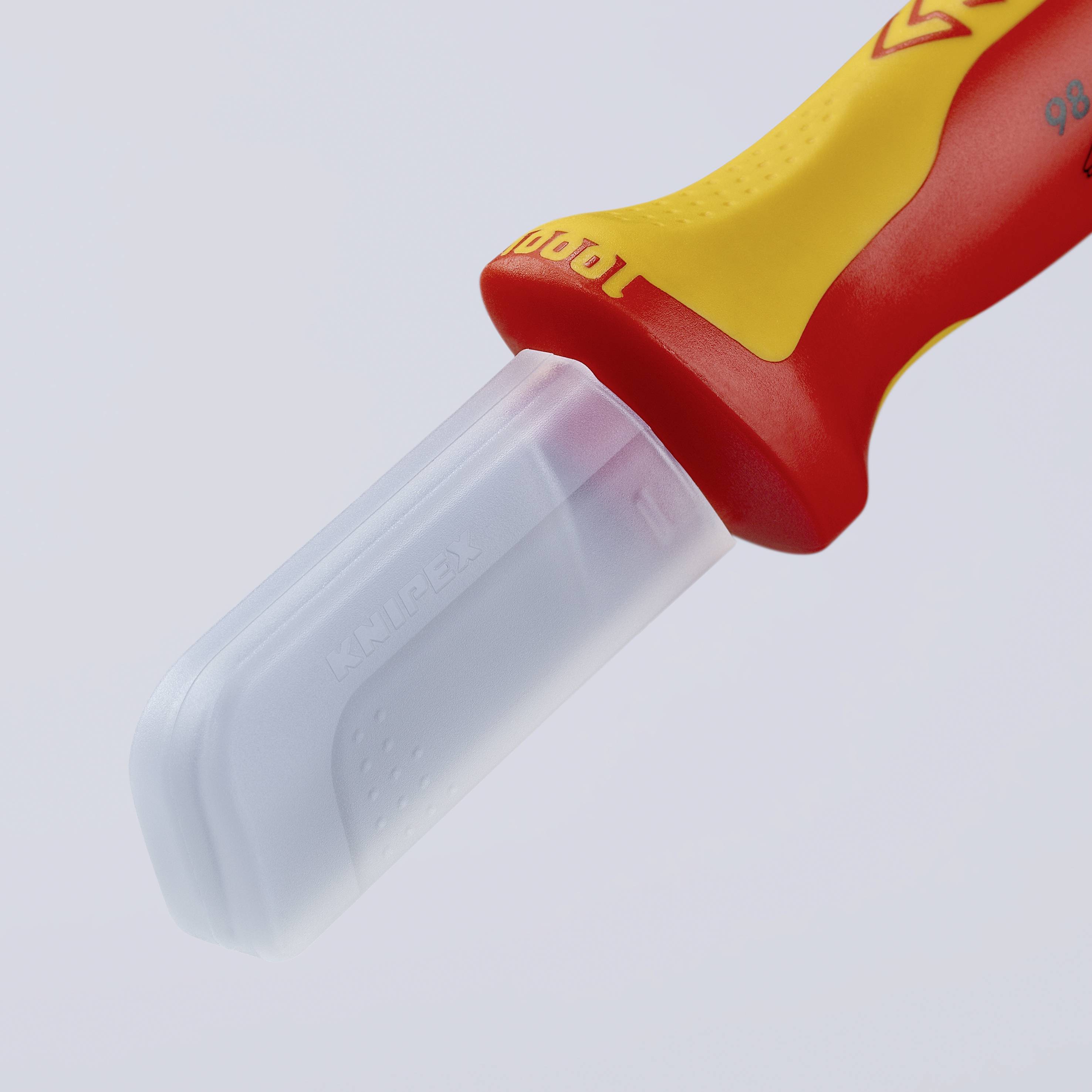 Un couteau avec un manche jaune et rouge et un protège-lame transparent, arborant le logo Knipex. Adapté pour un rangement en toute sécurité.