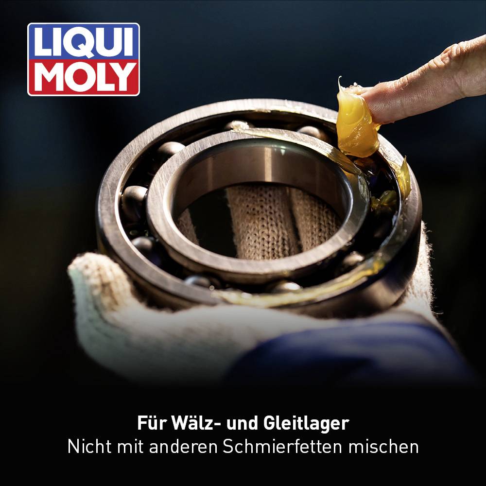 Une main applique de la graisse lubrifiante sur un roulement à billes. Au-dessus est écrit 'LIQUI MOLY'. En bas est inscrit 'Pour roulements à rouleaux et paliers. Ne pas mélanger avec d'autres graisses lubrifiantes'.