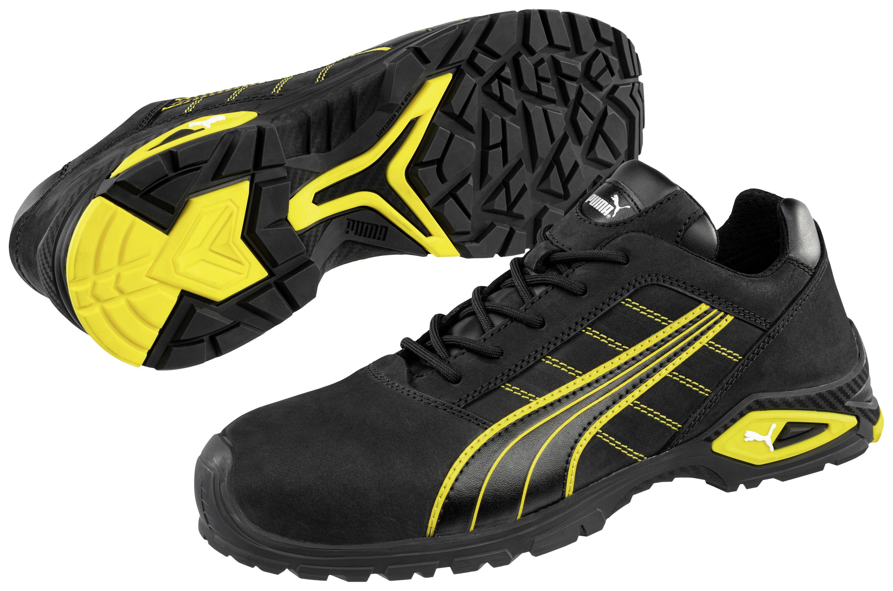 Baskets de sport noires avec des touches jaunes et semelle antidérapante, adaptées aux activités de plein air.