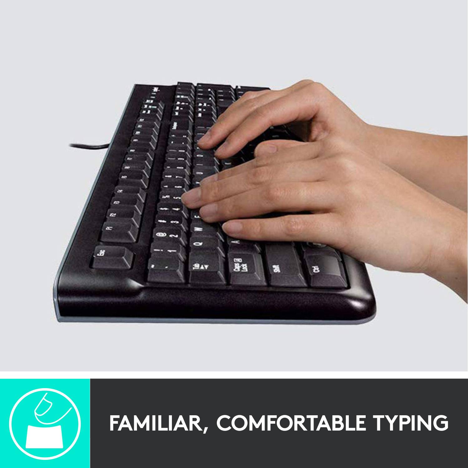 Une personne tape sur un clavier d'ordinateur noir. En dessous, il est écrit : 'Une frappe familière et confortable'.