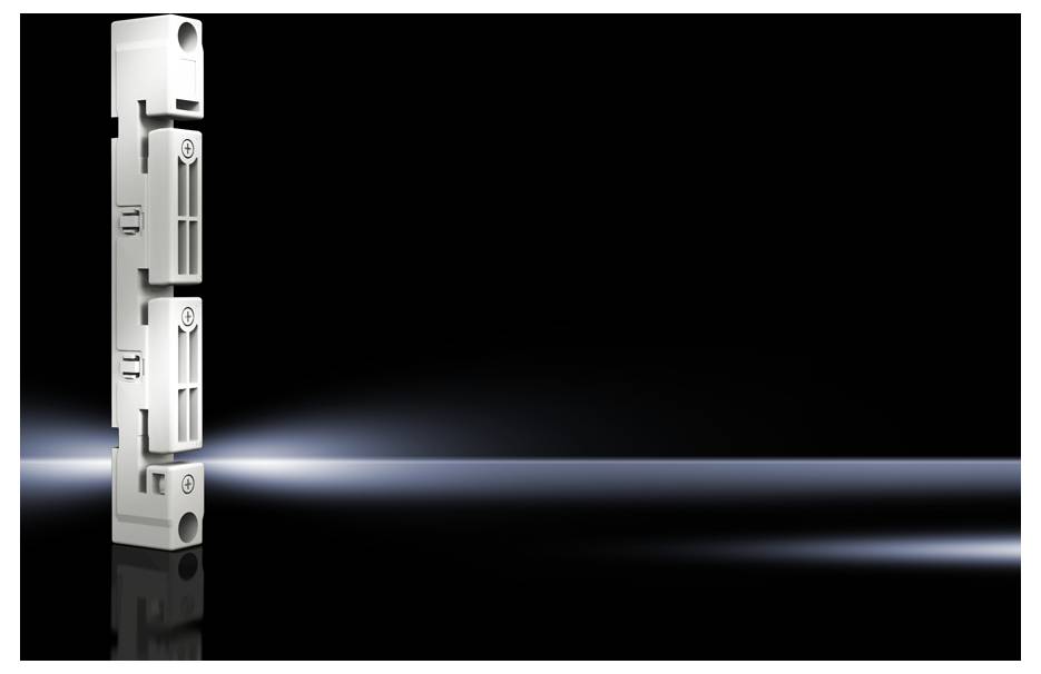 Un composant électrique blanc et vertical est placé sur un fond noir brillant, avec un faisceau lumineux derrière lui.