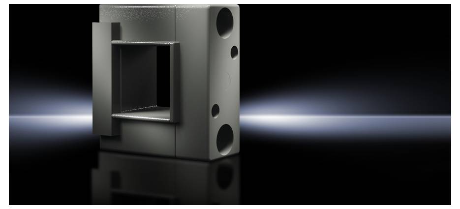 Bloc métallique gris avec échancrure rectangulaire et ouvertures rondes. En arrière-plan, un support noir et brillant.