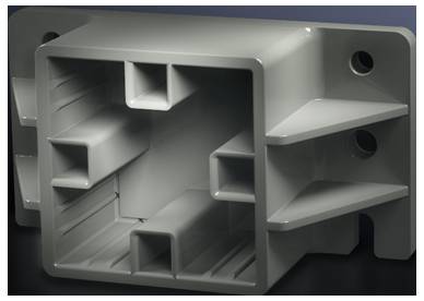 Boîtier en plastique avec des ouvertures rectangulaires et des bords arrondis, probablement destiné à des applications industrielles ou techniques.