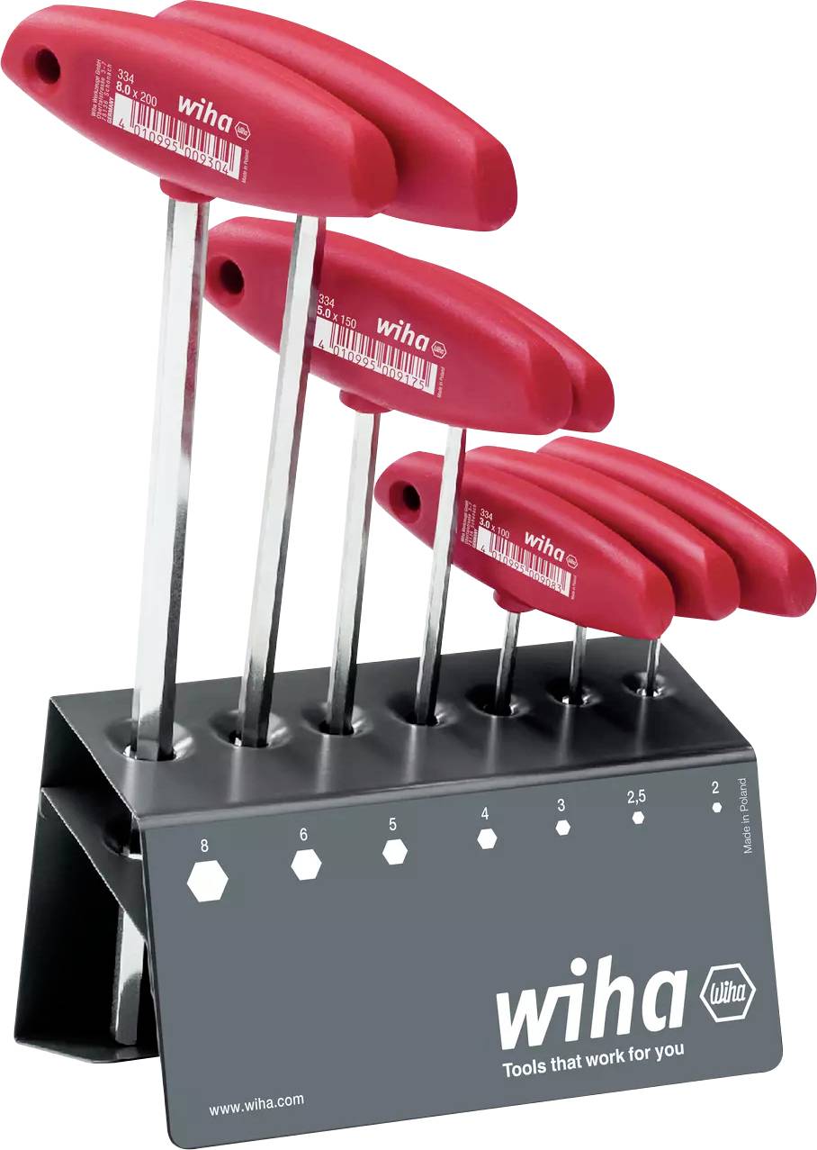 Tournevis à six pans creux avec poignées rouges, placés dans leur support. Tailles de 2,5 à 6 mm marquées sur le support.