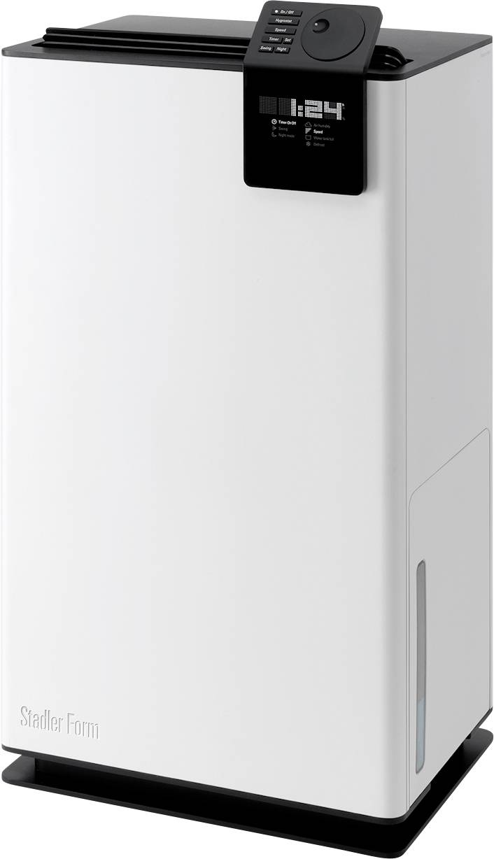 Humidificateur d'air avec écran numérique en haut, affichant l'heure '1:24', forme compacte et rectangulaire, en blanc et noir.