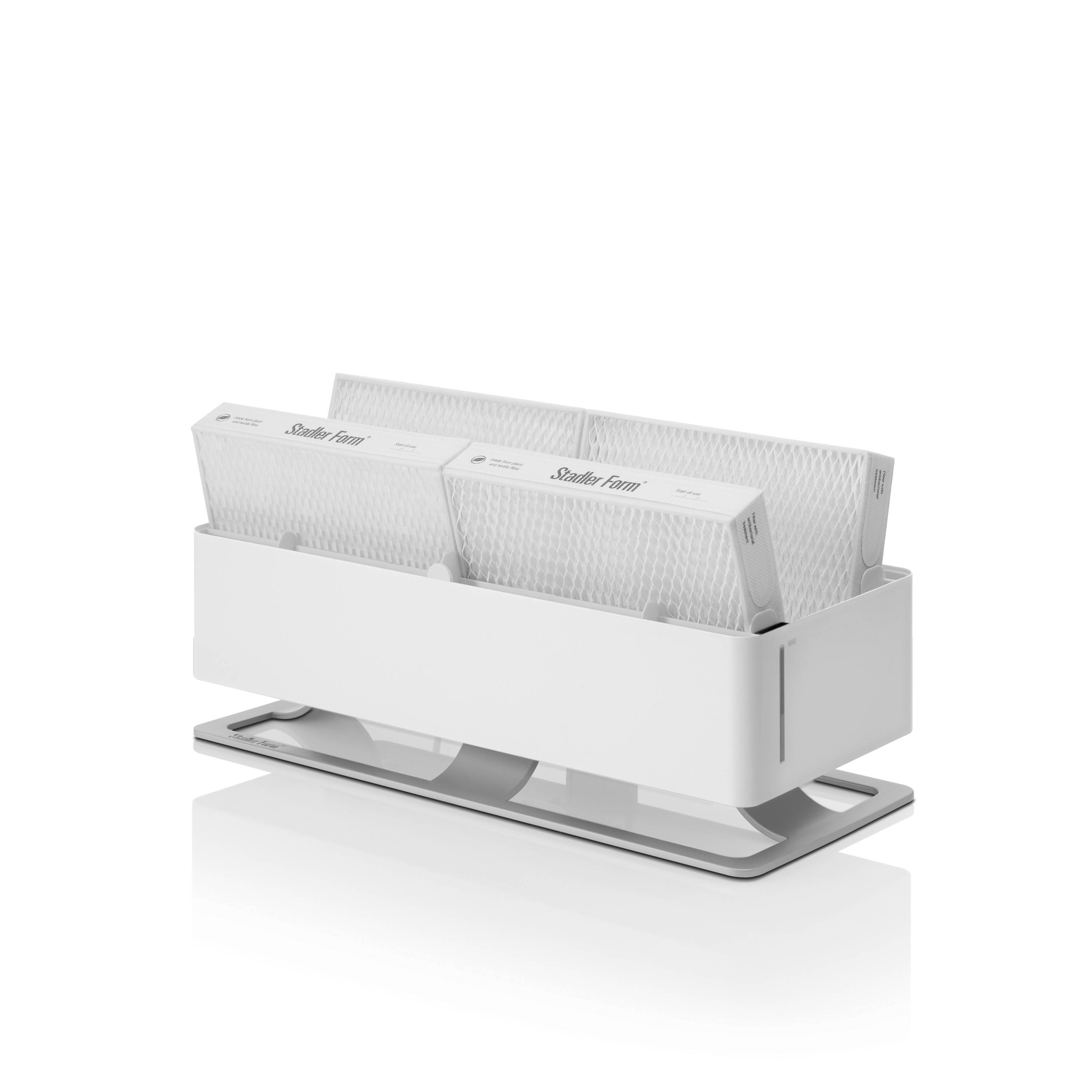 Distributeur de pilules blanc avec plusieurs boîtes positionnées en biais. Adapté au rangement et à l'organisation des boîtes de médicaments.