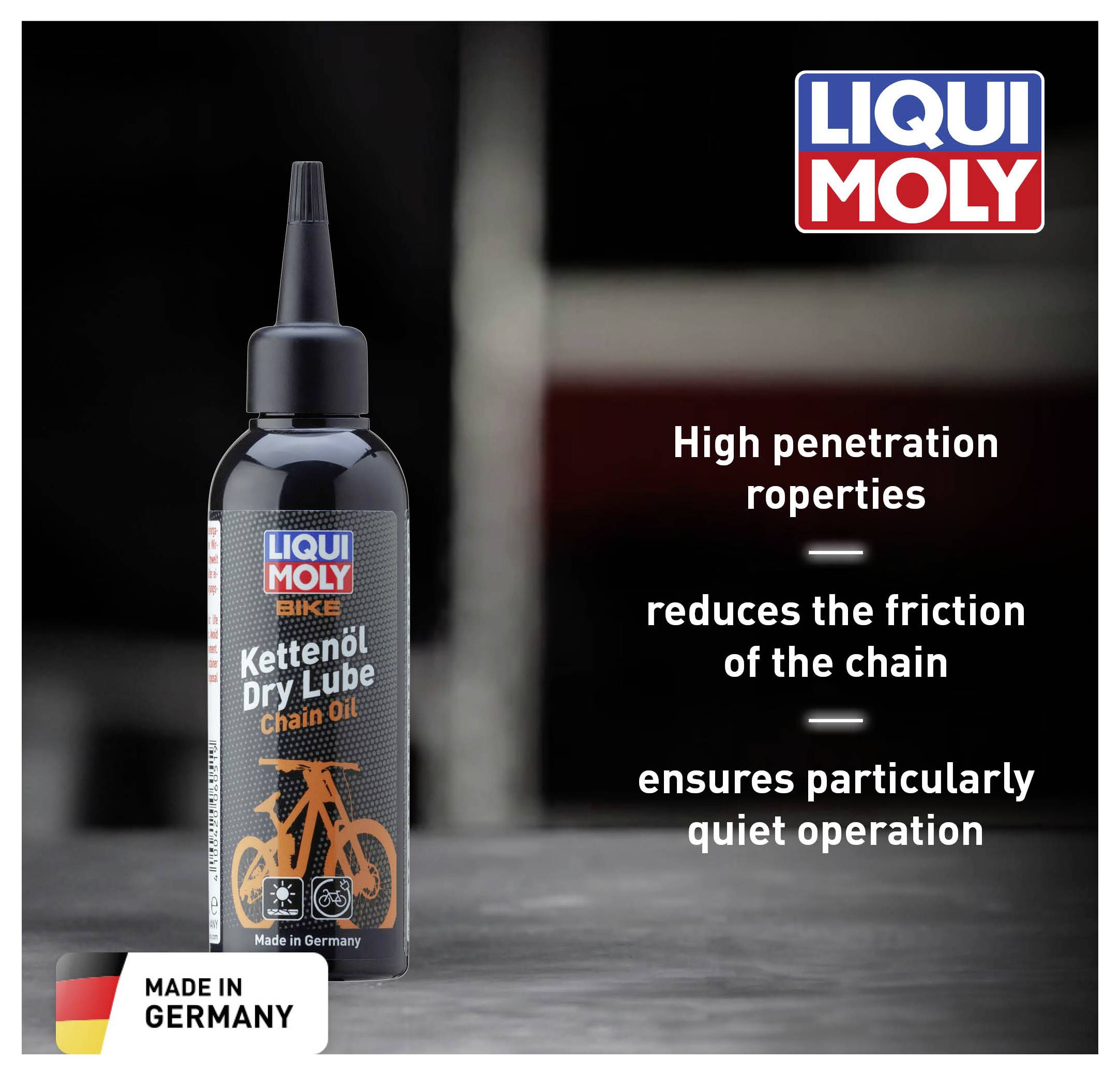 Une bouteille de LIQUI MOLY Huile de chaîne sur une table. Texte : 'Protection anticorrosion exceptionnelle. Réduit sensiblement la friction de la chaîne. Assure un fonctionnement particulièrement silencieux et fluide.' Made in Germany.