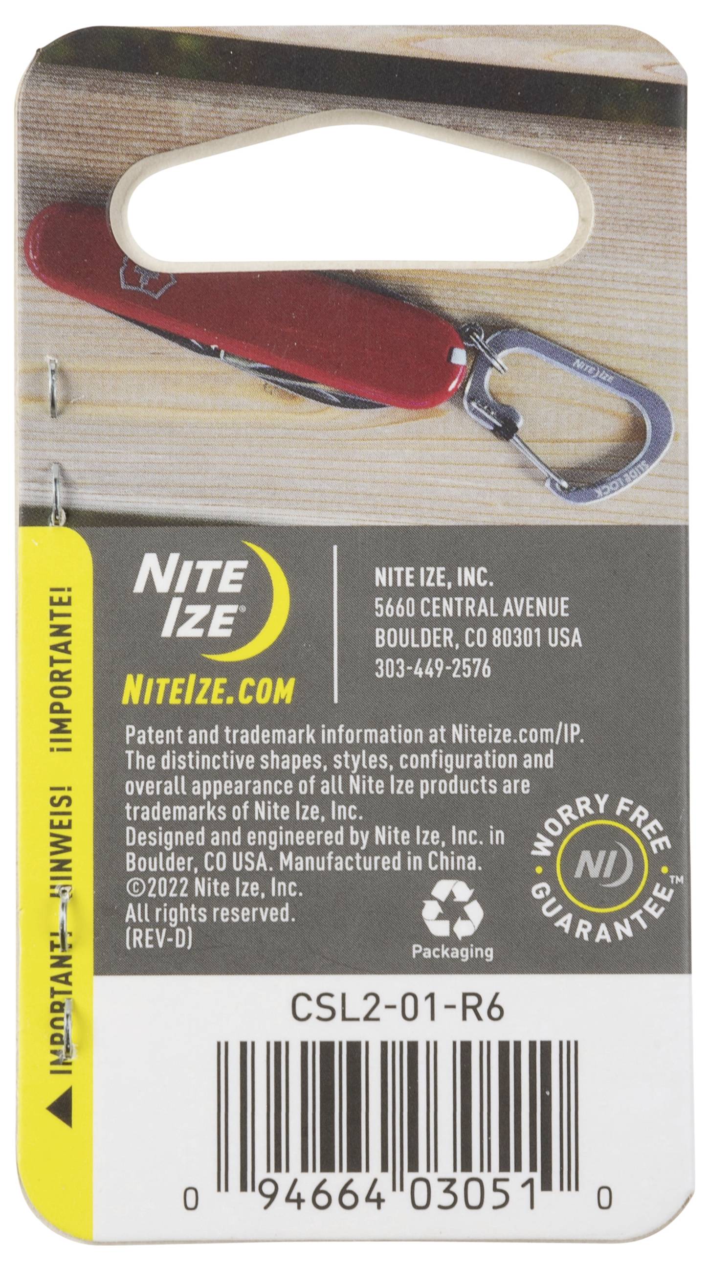 Couteau de porte-clés DoohicKey - Un couteau compact rouge avec une boucle argentée. Caractéristiques comprenant le nom du produit, le logo Nite Ize, et la garantie.