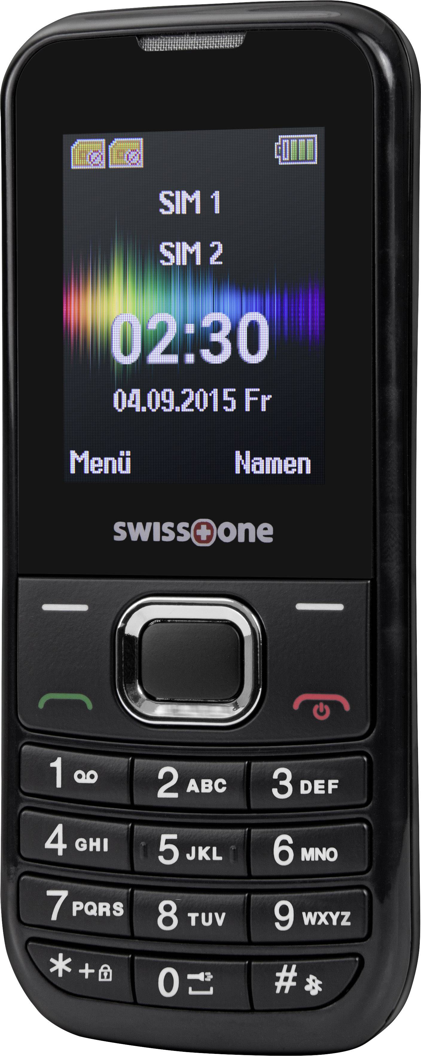 Téléphone portable noir avec touches et écran couleur. Affiche la date '04.09.2015' et l'heure '02:30'. SIM 1 et SIM 2 sont indiqués en haut à gauche.