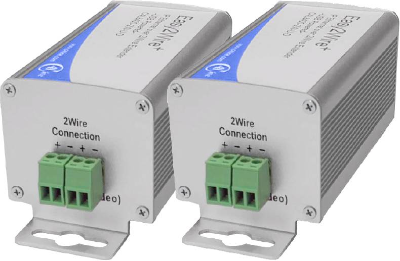 Deux dispositifs métalliques portant l'inscription '2Wire Connection' et munis de bornes de connexion vertes. Ils ont un design similaire et semblent probablement destinés au câblage ou à la transmission de données.