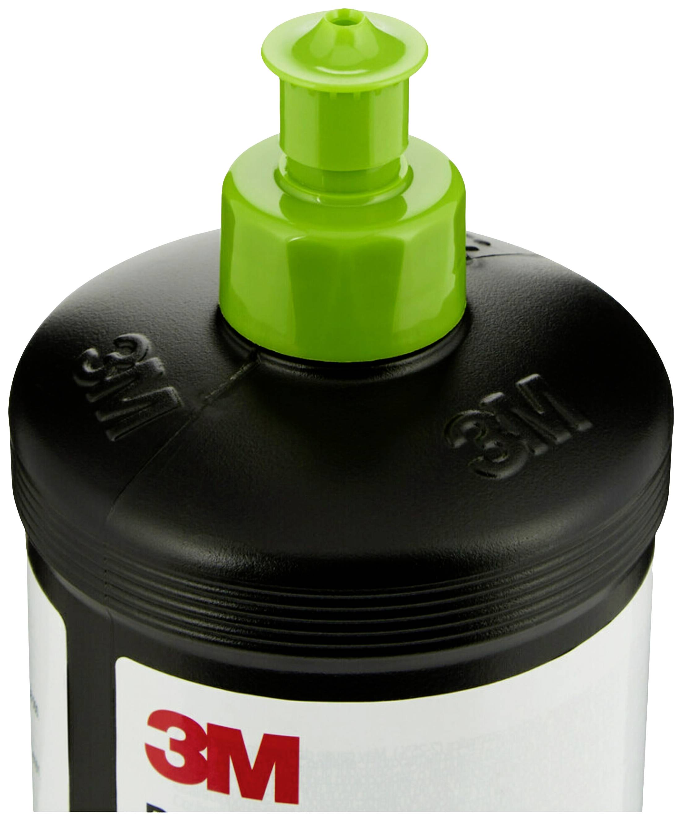 Une bouteille noire avec un bouchon vert, marque '3M'.
