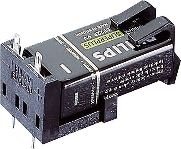 Composant électronique Philips, noir, avec broches de connexion et marquage : « SUPPRESS » et « ENGLAND ». Forme rectangulaire, en céramique.