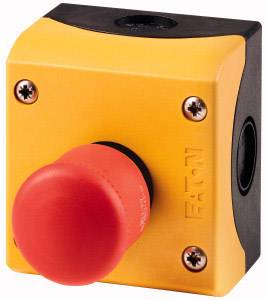 Un bouton d'arrêt d'urgence rouge sur un boîtier jaune. Le bouton sert à un arrêt rapide en cas d'urgence.