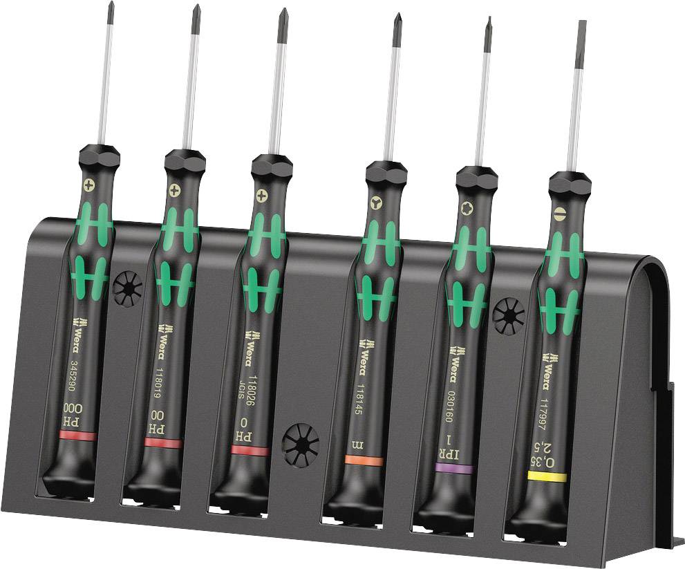 Six tournevis de précision dans un support noir. Différentes tailles et types, identifiables par des marquages colorés.