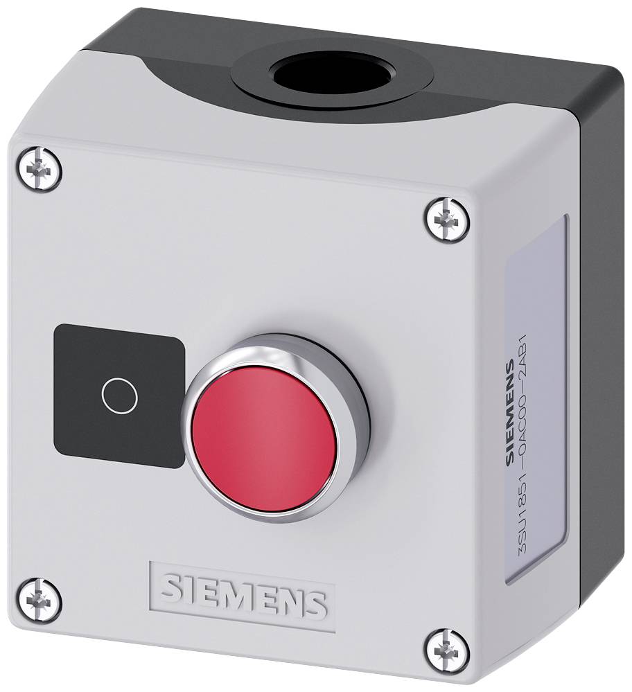 Boîtier gris avec un grand bouton d'arrêt d'urgence rouge au centre. Quatre vis maintiennent le boîtier assemblé. Marque 'Siemens'.