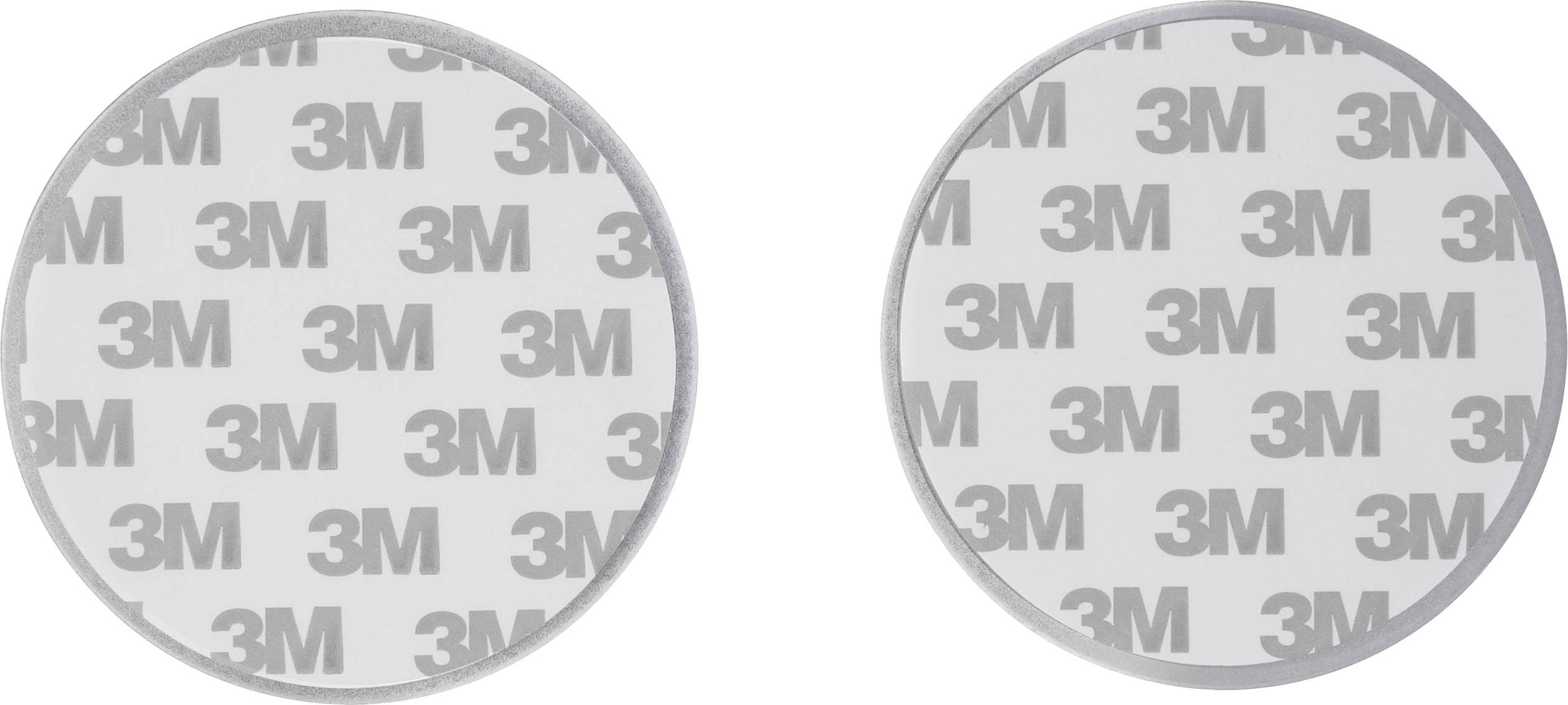 Deux pastilles adhésives rondes grises portant l'inscription « 3M », placées côte à côte sur un fond blanc.