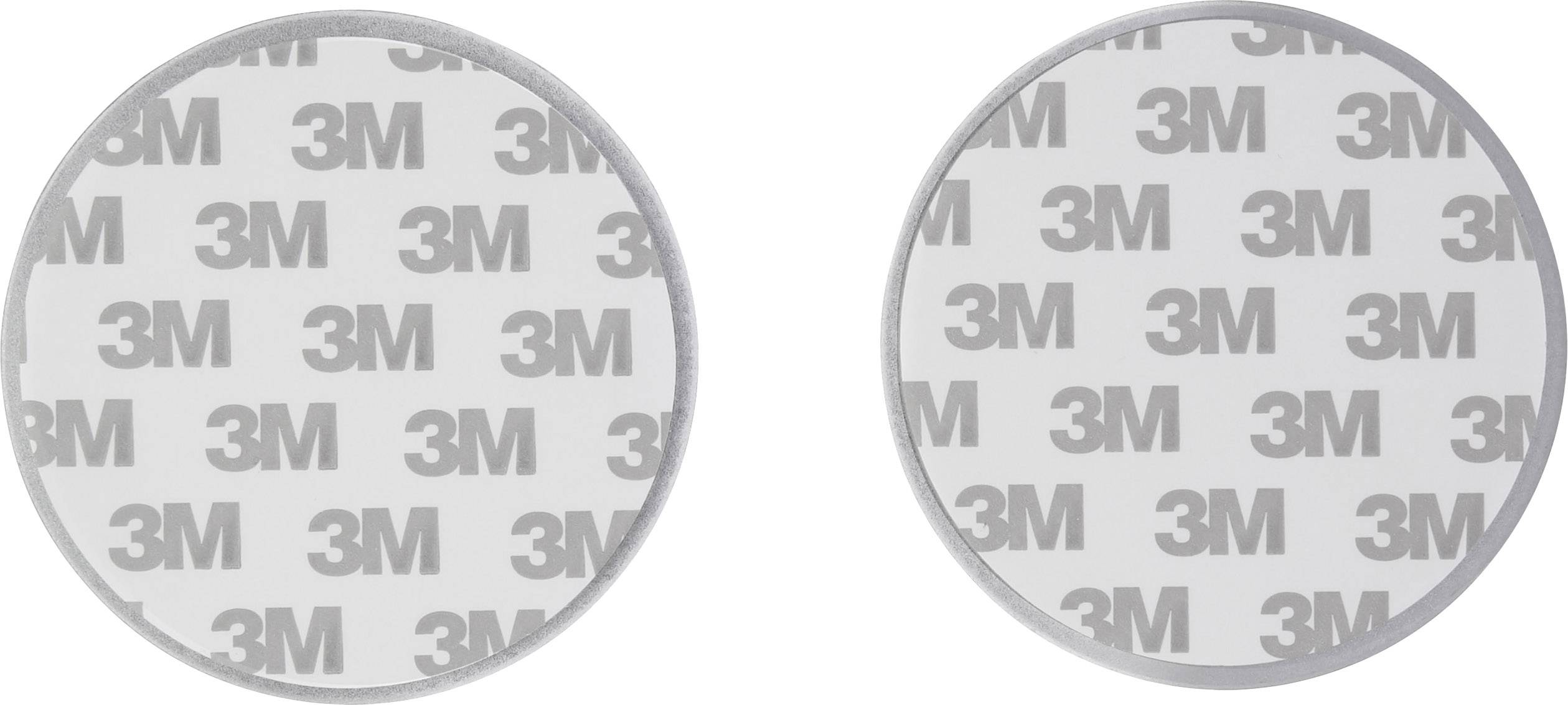 Deux tampons adhésifs ronds gris de 3M, disposés de manière uniforme côte à côte, sur un fond clair.