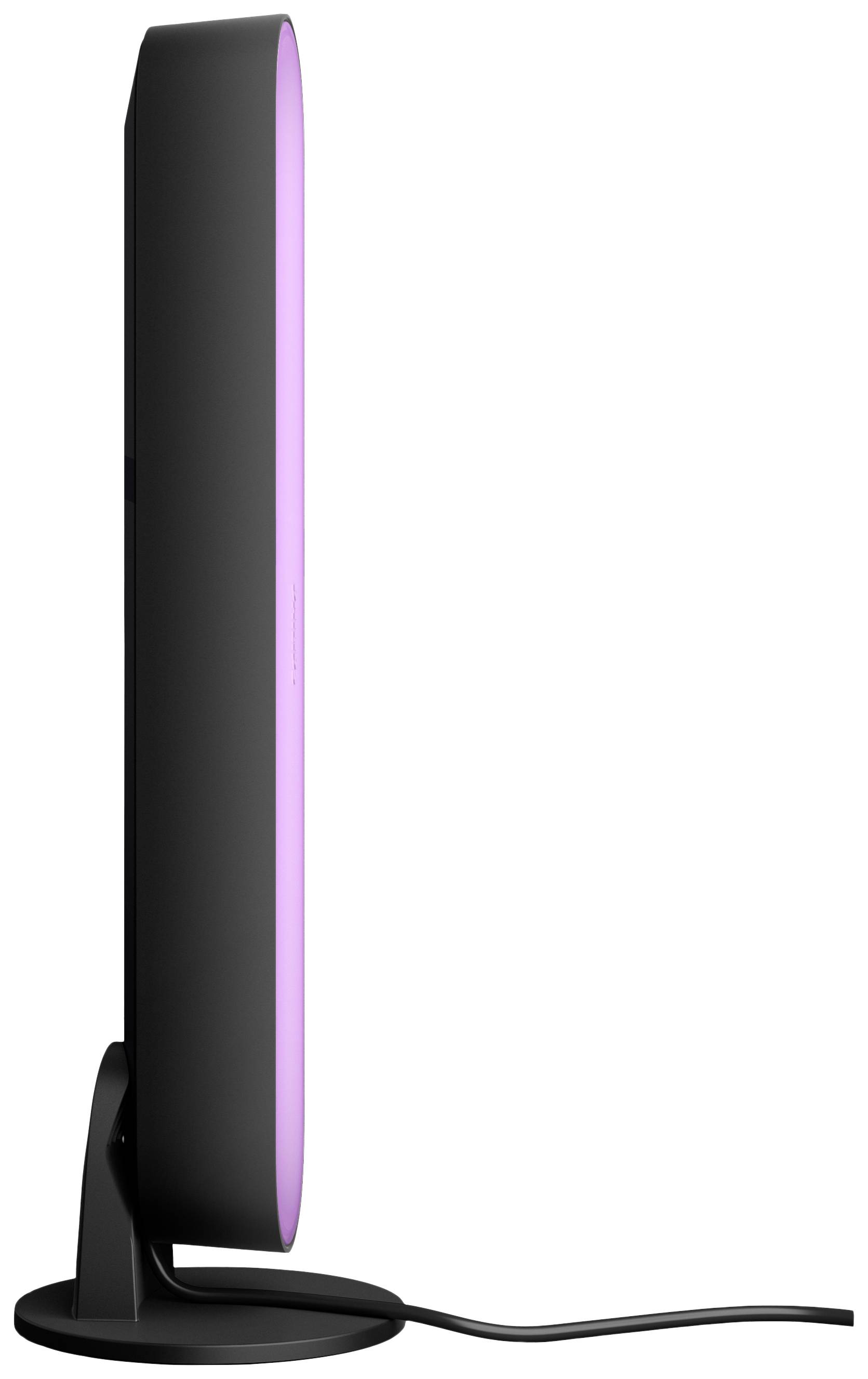 Une lampe LED svelte et noire de profil, projetant une lumière violette, reposant sur un support circulaire.