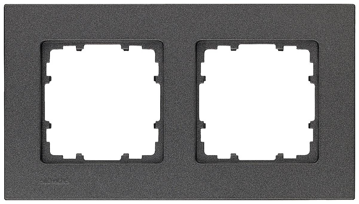 Cadre de finition double noir pour interrupteurs ou prises électriques, avec deux ouvertures carrées.