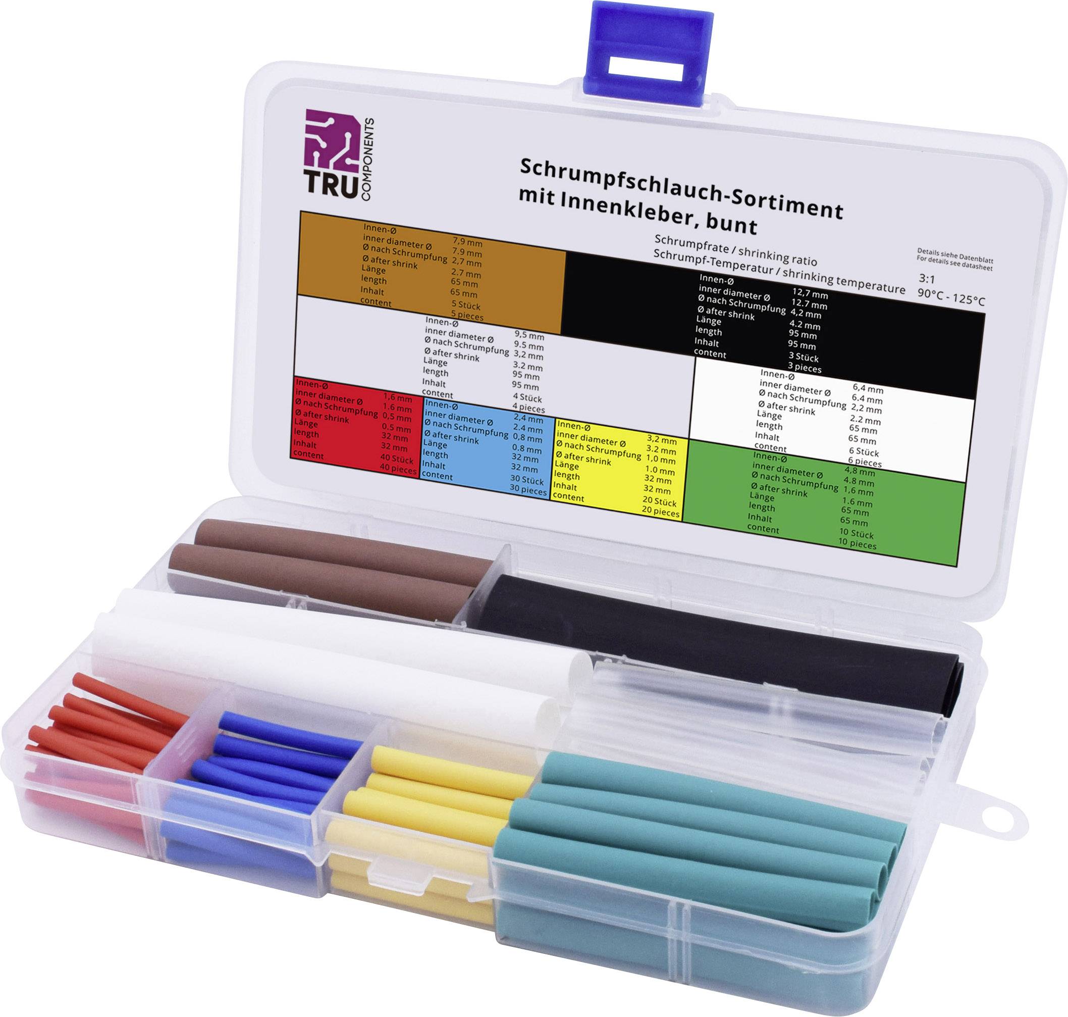 Assortiment de gaines thermorétractables dans un boîtier transparent à plusieurs compartiments de différentes couleurs.