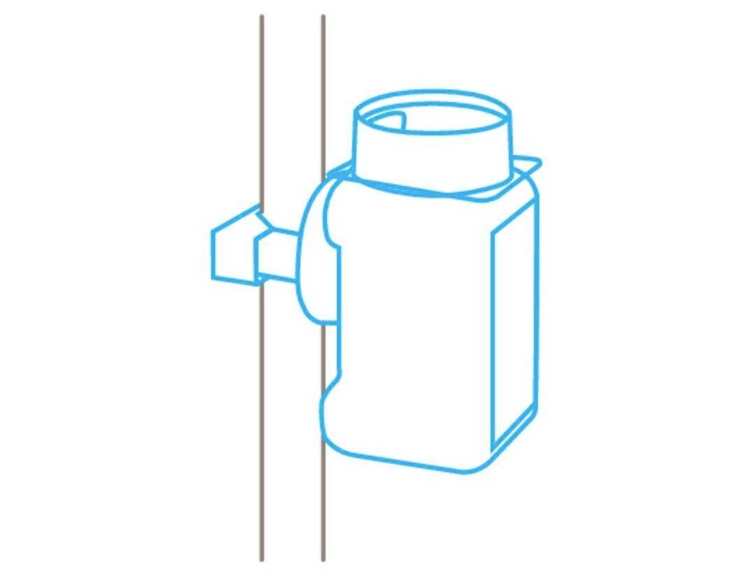 Esquisse d'un appareil de ventilation monté au mur, de forme rectangulaire avec un raccordement circulaire en haut. L'appareil est encadré en bleu.