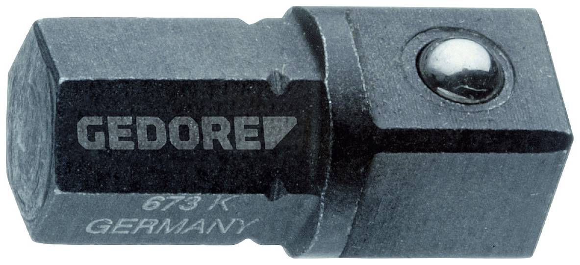 Un adaptateur gris foncé de forme hexagonale et cylindrique. Inscription 'GEDORE' et 'GERMANY', en métal avec une boule à son extrémité.