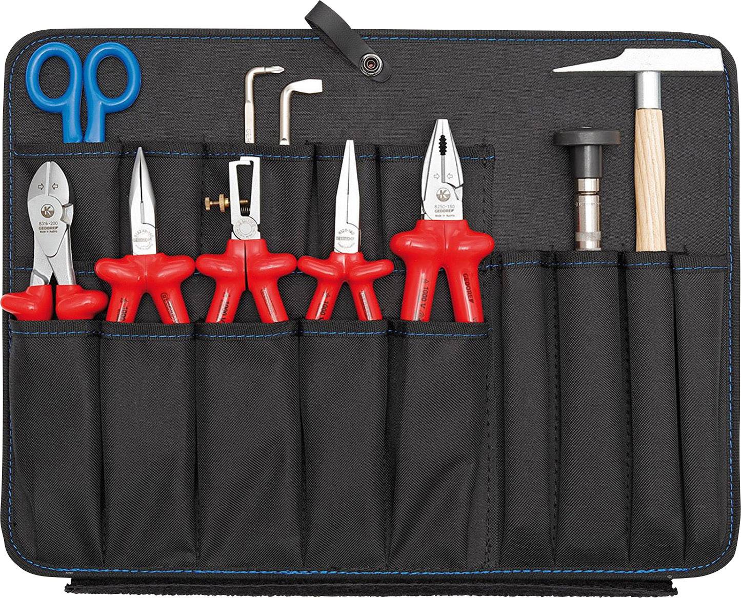 Un ensemble d'outils à main, comprenant des ciseaux, des pinces et un marteau, tous soigneusement rangés dans un support en tissu noir.