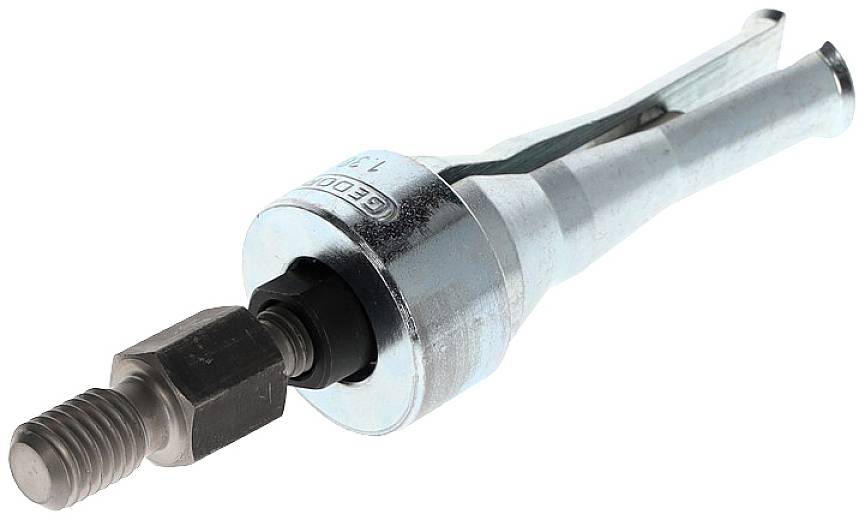 Un outil métallique fileté avec une pointe conique, utilisé pour fixer ou détacher des pièces.