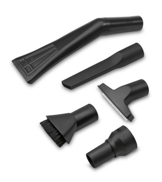 Cinq embouts d'aspirateur noirs, de formes différentes pour divers usages de nettoyage, sur un fond blanc.