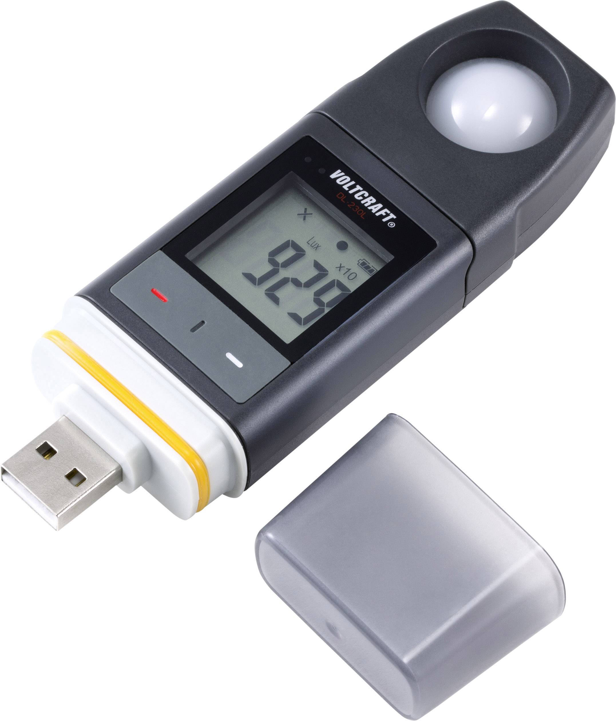 Appareil de mesure de lumière avec port USB et affichage montrant le chiffre '929', avec son capuchon de protection placé à côté.