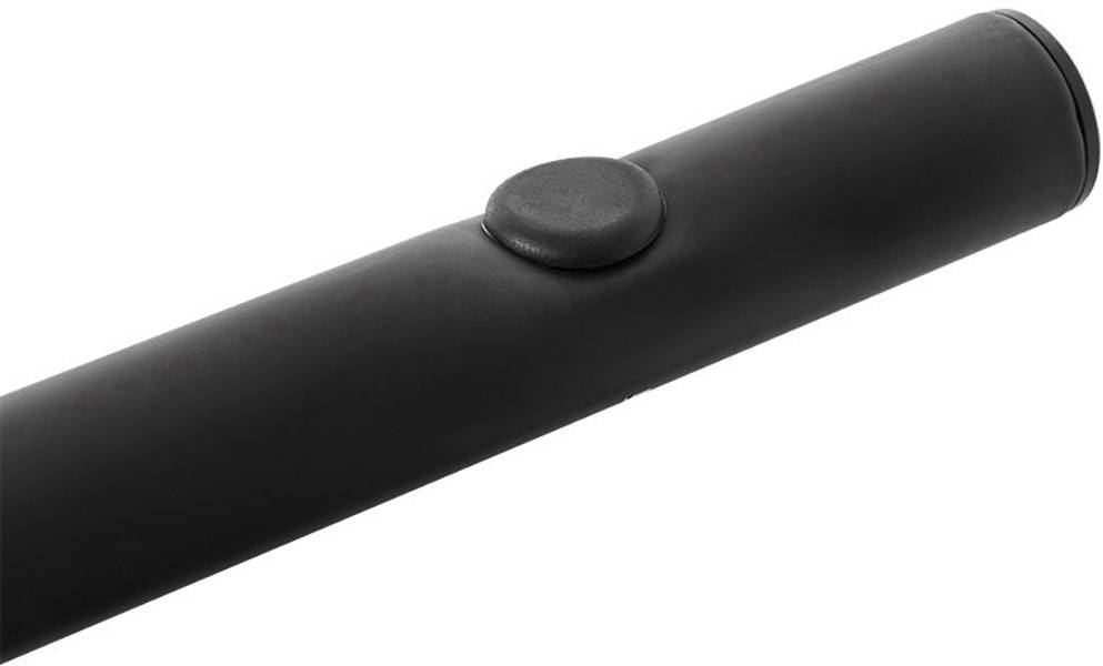 Un objet noir, allongé, avec un relief circulaire en son centre, sur un fond blanc.