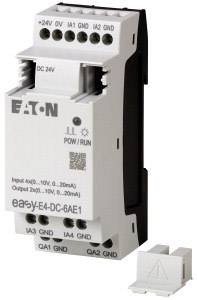 Dispositif de commutation électronique d'Eaton, gris et blanc, doté de plusieurs bornes de connexion, identifié avec '+24V', 'OV', 'IA1', 'IA2', 'GND', et d'autres.